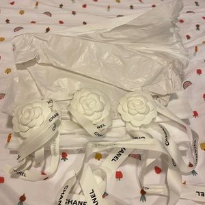 Chanel flowers and ribbons.